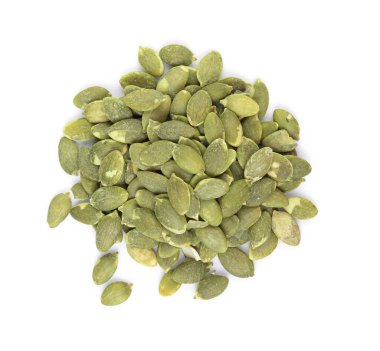 Beyaz arka planda balkabağı tohumları. Üst manzara.