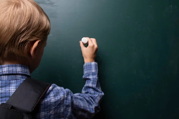 Boy Writing Chalk Blackboard Back School Concept — Photo