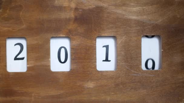 Μετρητής Σταματά Στο 2023 Ξύλινη Κίνηση Αριθμούς Έτος Στο Ημερολόγιο — Αρχείο Βίντεο