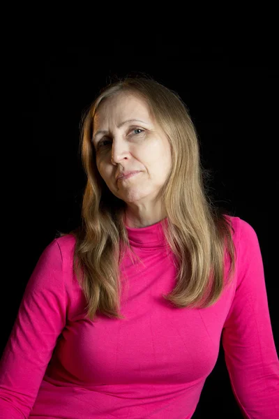 A woman in a red blouse Stock Image