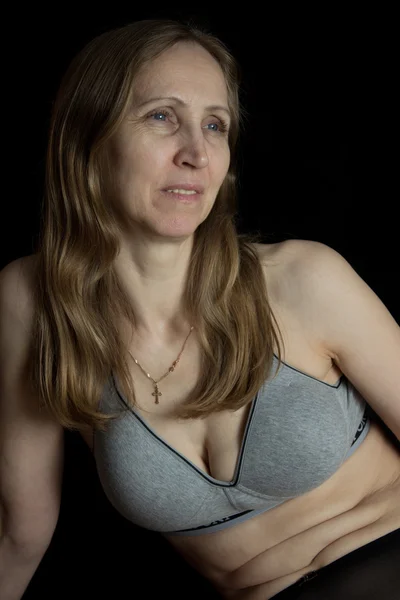 Woman in gray bra — Stock Photo, Image