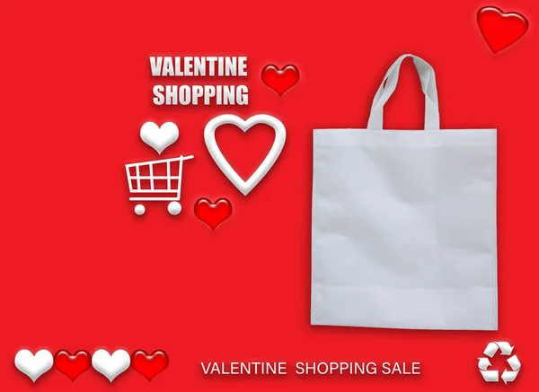 Valentine\'s gift ECO bags. Happy Valentines Day Shopping Bags Sale Banner with heart and shopping basket. copy space for text.