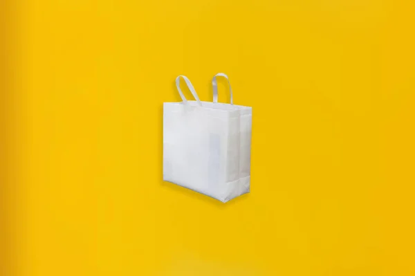 Beautiful Non Woven Grocery Shopping Bag Yellow Background Tote Eco — Stock Photo, Image