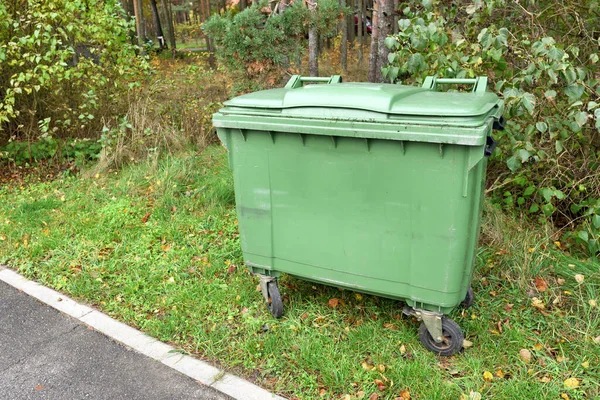 Large garbage container, trash dumpster at city park