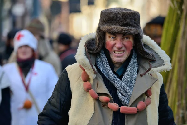 Peoples in traditional masks — Stock Photo, Image