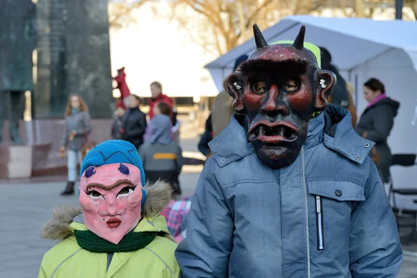 Peoples in traditional masks — Stock Photo, Image