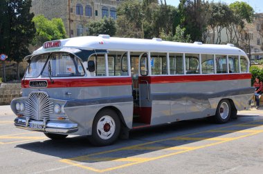 Legendary and iconic Malta public buses clipart