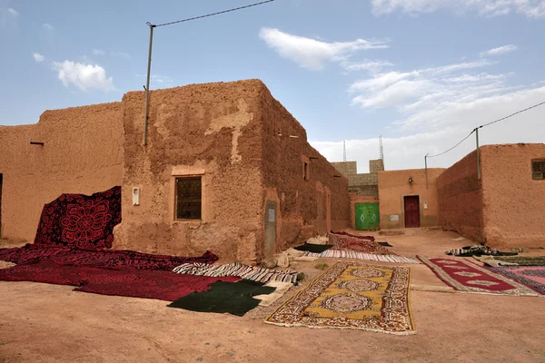Traditional berber carpets drying in open air — стокове фото