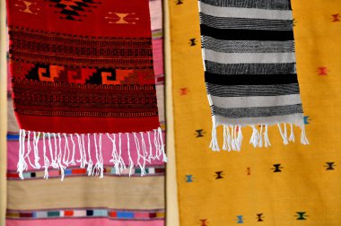 Merida, Mexico - June 11, 2023: Colorful Fabric and carpets for sale in Merida city old town, Yucatan, Mexico