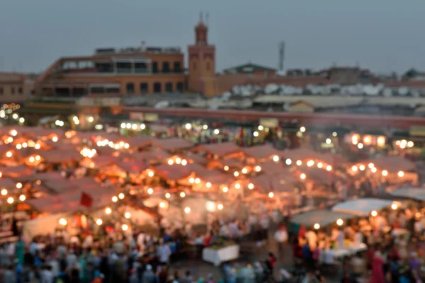 Linsenunschärfe. jemaa el fna Platz bei Sonnenuntergang, in Marrakesch, Marokko — Stockfoto