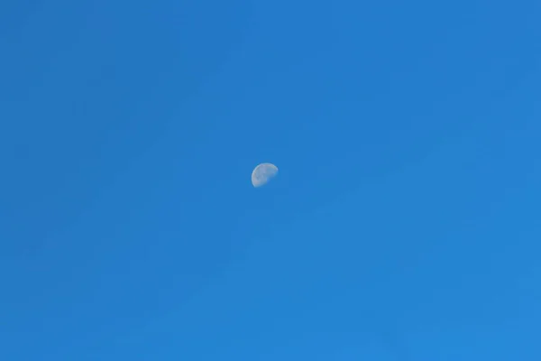 moon in the daytime sky