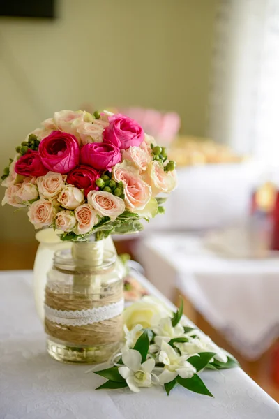 Bouquet of roses arranged in a vase Stock Picture