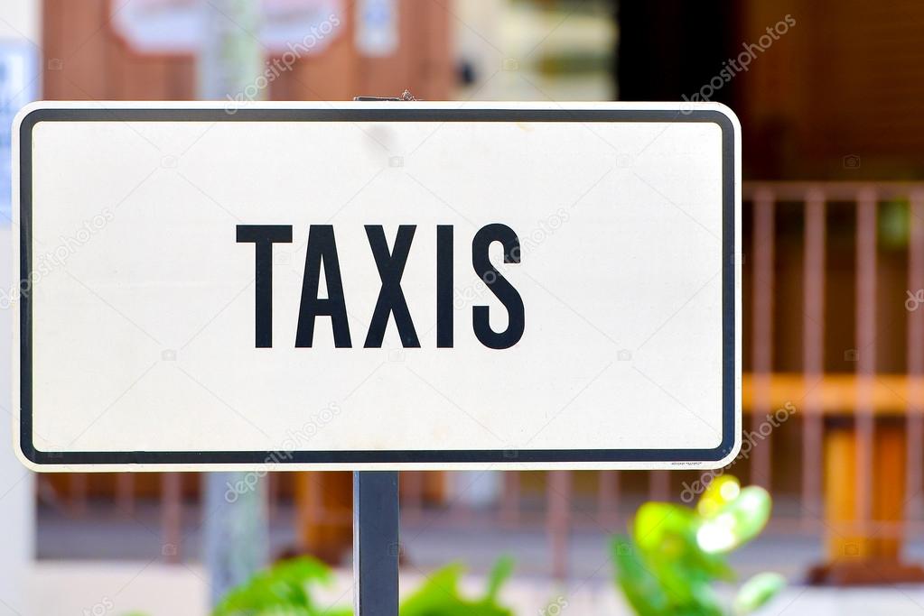 White taxis sign