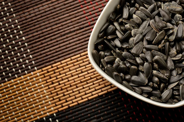 Sunflower seeds in bowl — Stock Photo, Image