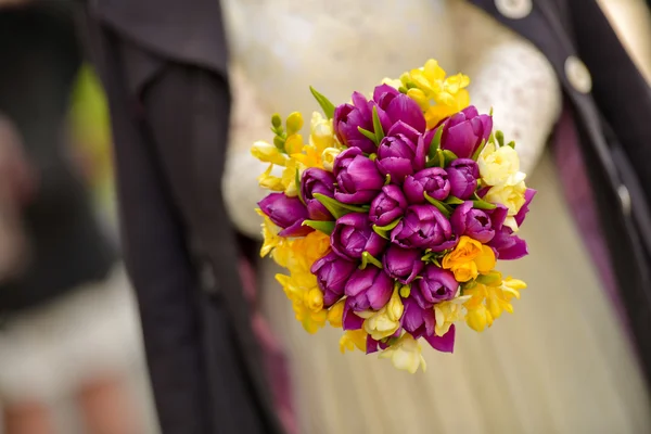 Wedding bouquet with purple tulips with yellow freesias — Stock Photo, Image