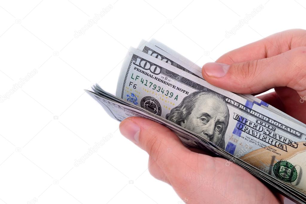 hand holding hundred dollars on white background