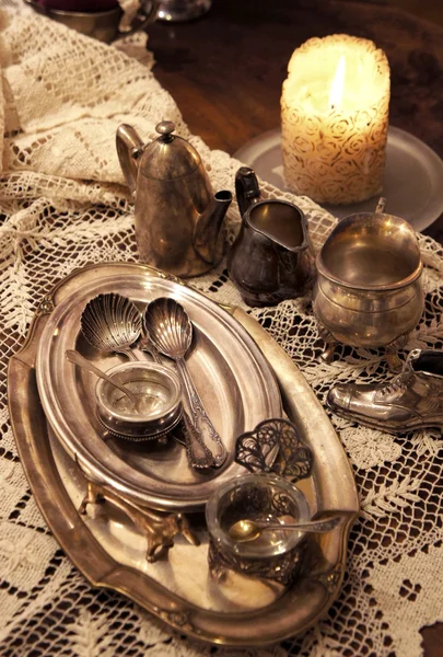Mix of old silver and bronze dish and figurines — Stock Photo, Image