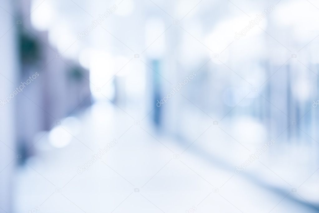 medical blurred background, empty hospital corridor in neon blue