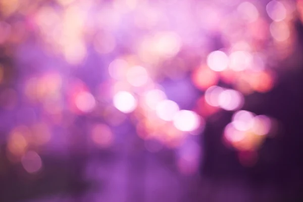 紫のボケ ライト抽象的な背景 — ストック写真