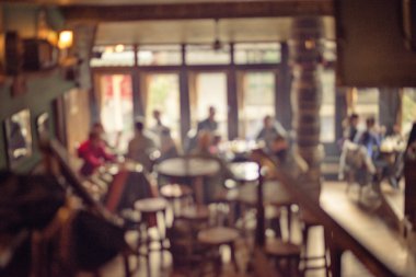 İnsanlar kafede bokeh ışıklı arka plan vintage filtre için eski etkisi, arka plan bulanık bulanıklık