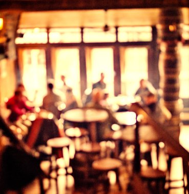 İnsanlar kafede bokeh ışıklı arka plan vintage filtre için eski etkisi, arka plan bulanık bulanıklık