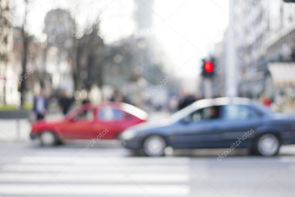 Defocused cars in city traffic jam with blurred bokeh