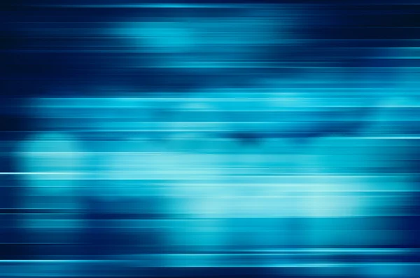 Digitally generated image of blue light and stripes moving fast — Stock Photo, Image