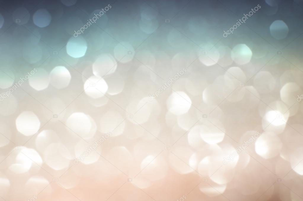 pastel colored defocused Christmas lights. Blurred abstract background. Abstract bokeh lights. Defocused background.