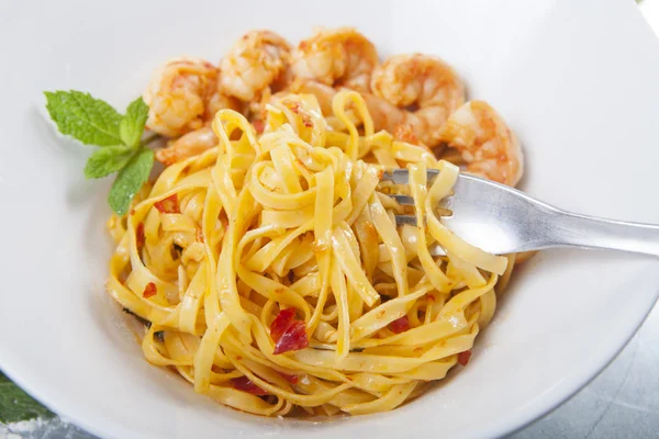 Pasta With Shrimps and Chili Peppers Stock Image