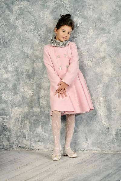 lovely girl in pink coat