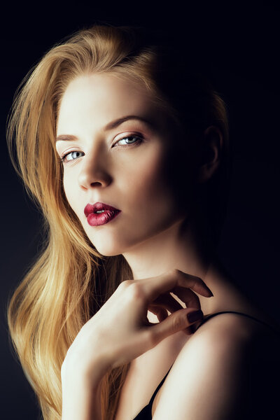 Portrait of a gorgeous blonde woman with sensual maroon lips. Beauty, fashion. Make-up, cosmetics.
