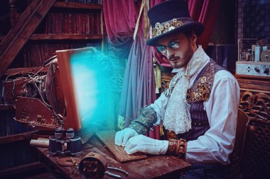 Yakışıklı steampunk bilim adamı mucidi Viktorya dönemi iç mimarisi ile laboratuarında çalışıyor.. 