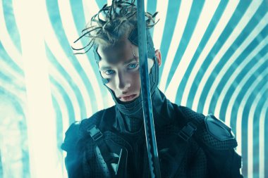 Cyberpunk world. Militant cyberpunk warrior in a protective suit fights with a sword  in his hands in neon light. Game, virtual reality.