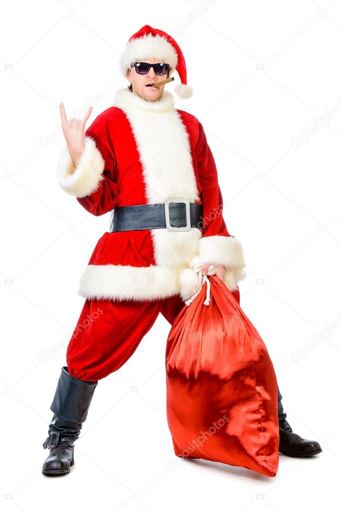 bad Santa. Cheerful young man in a costume of Santa Claus