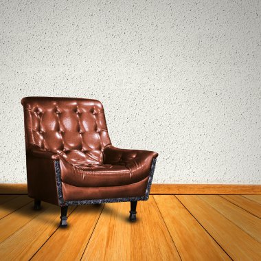 Parlak beton zemin üzerine ahşap flo karşı modern koltuk