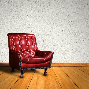 Parlak beton zemin üzerine ahşap flo karşı modern koltuk