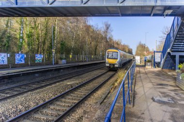 British Rail Great British Railways Railway station West Midlands England UK. Passenger suburban rural commuter platform showing tracks and rails.