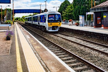 British Rail Great British Railways Railway station West Midlands England UK. Passenger suburban rural commuter platform showing tracks and rails.