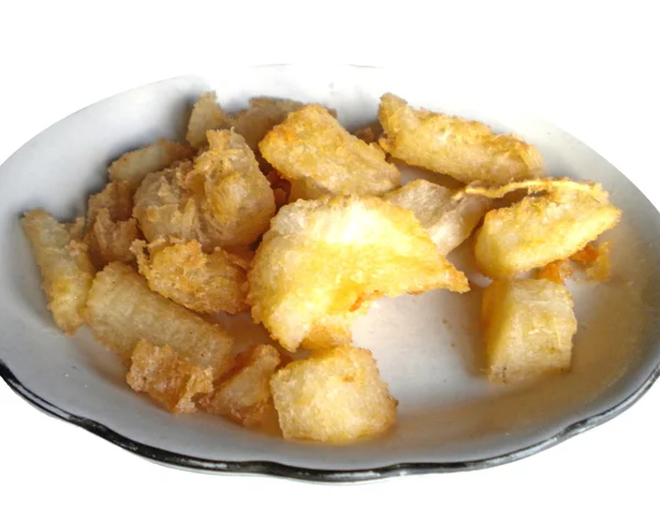 Fried yucca or cassava on a plate — Stock Photo, Image