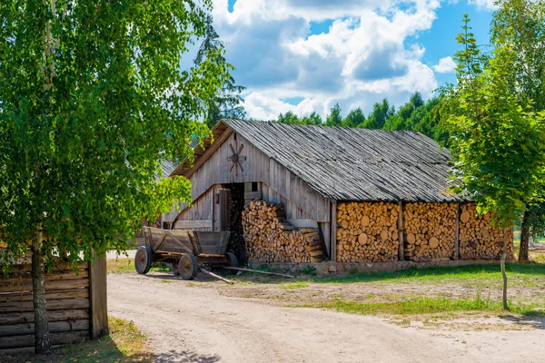 Barn full of reserve Firewood in rural areas — Stock Photo, Image