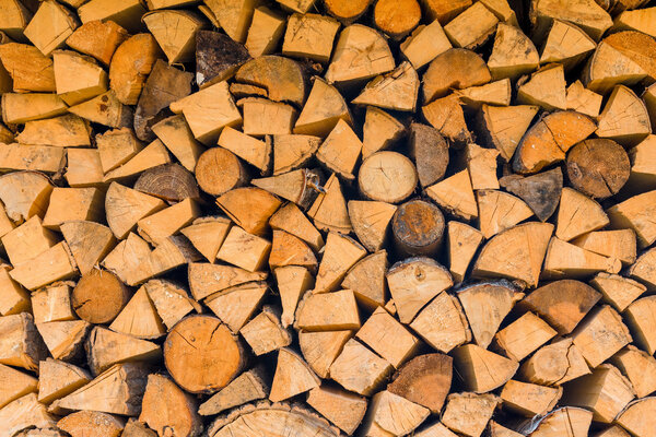background - woodlogs cleaved for the stove close-up