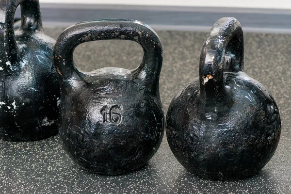 Round heavy weights on the floor in the gym closeup — Stock Photo, Image