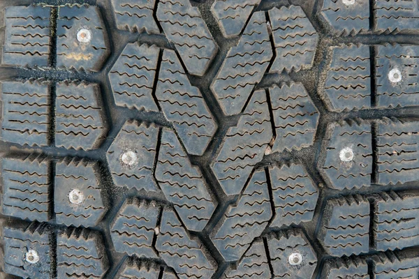 Protector of winter tires with spikes close-up — Stock Photo, Image