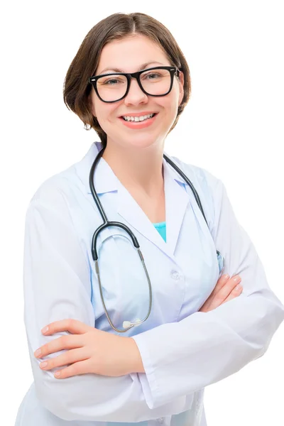 Chica en ropa médica y gafas posando sobre un fondo blanco —  Fotos de Stock