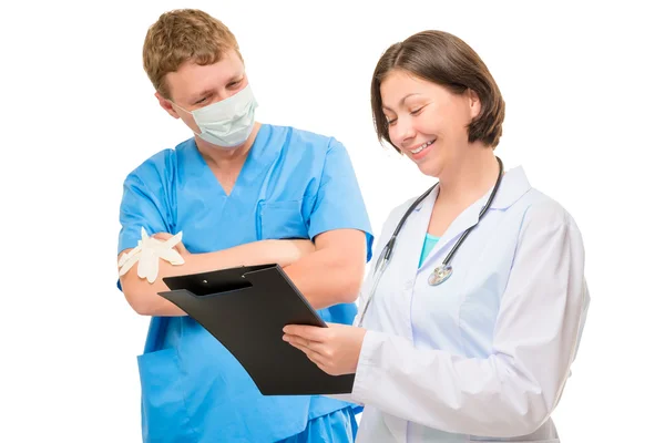 Doctor surgeon shows something funny in a folder — Stock Photo, Image