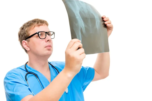 Radiologist examines the hip part of the patient carefully shot — Stock Photo, Image