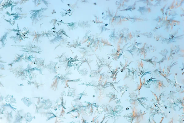 Vackra vinter frost mönster målat på glas — Stockfoto