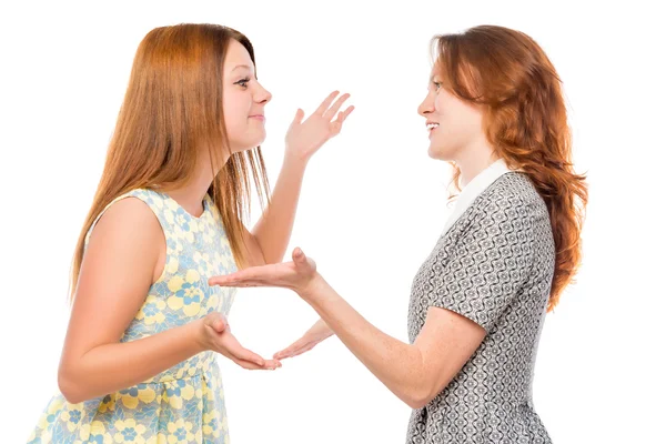 Portrait of a beautiful young girlfriends arguing on a white bac — Stock Photo, Image