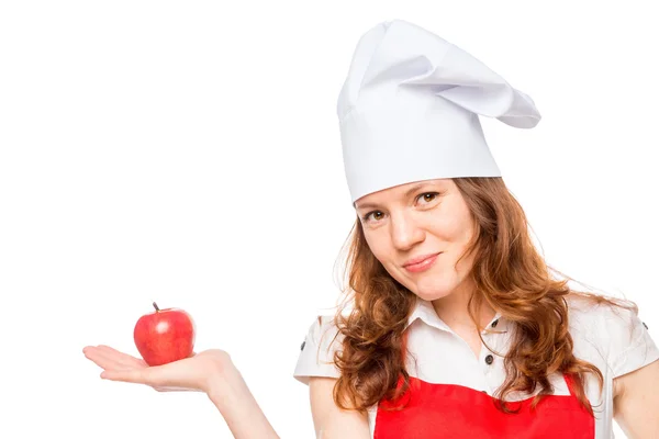 Portret szefa kuchni trzymając w dłoni jabłko na biały ba — Zdjęcie stockowe