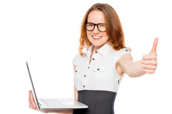 Successful woman with a laptop holding a thumb up in isolation — Stock Photo, Image